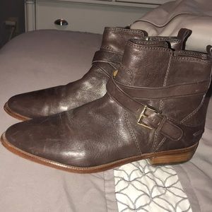 Brown Coach ankle boots with gold buckles